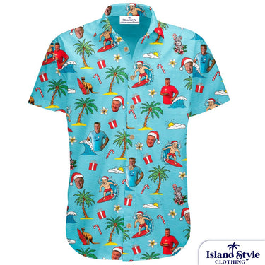 Hawaiian shirt with Christmas-themed design featuring palm trees, presents, and people in Santa hats on a blue background.