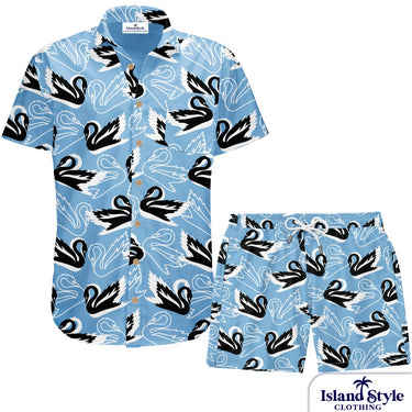 Blue shirt and shorts set with black and white swan pattern on a white background, featuring Island Style Clothing brand.