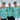 Three men wearing matching blue patterned shirts with a brand logo, standing outdoors.