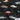 Pattern of vintage cars on a black background with Island Style Clothing logo.