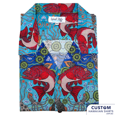 Custom Shirts and shorts made for Kuku Bulkaway Indigenous Art Gallery, Cooktown, FNQ. They paint stories they were taught as children about the local bush, food and animals. They supplied photos of their hand-painted art (original paintings you can view in our photo gallery). From there our clever design team created a seamless pattern and we turned them into wearable art on shirts and shorts. Deadly style! Main feature is Coral Trout 100% Cotton Hawaiian Shirts and Shorts