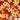 Tropical floral pattern with yellow flowers, red and white leaves on a red background, Island Style Clothing logo.