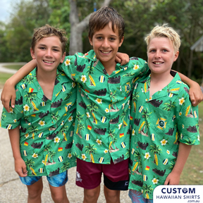 These custom shirts were designed for the Dicky Beach Surf Life Saving Club at one of our local beaches here on the Sunshine Coast, Queensland.  These eye-catching shirts feature a local wreck, logo, surfboards with a background of frangipanis and palms.  100% soft rayon Adults & Kids cuts Chest pocket Coconut buttons