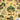 Patterned fabric with trees, animals, and buildings on a beige background, featuring 'Island Style Clothing' logo.