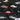Pattern of vintage cars on a black background with Island Style Clothing logo.