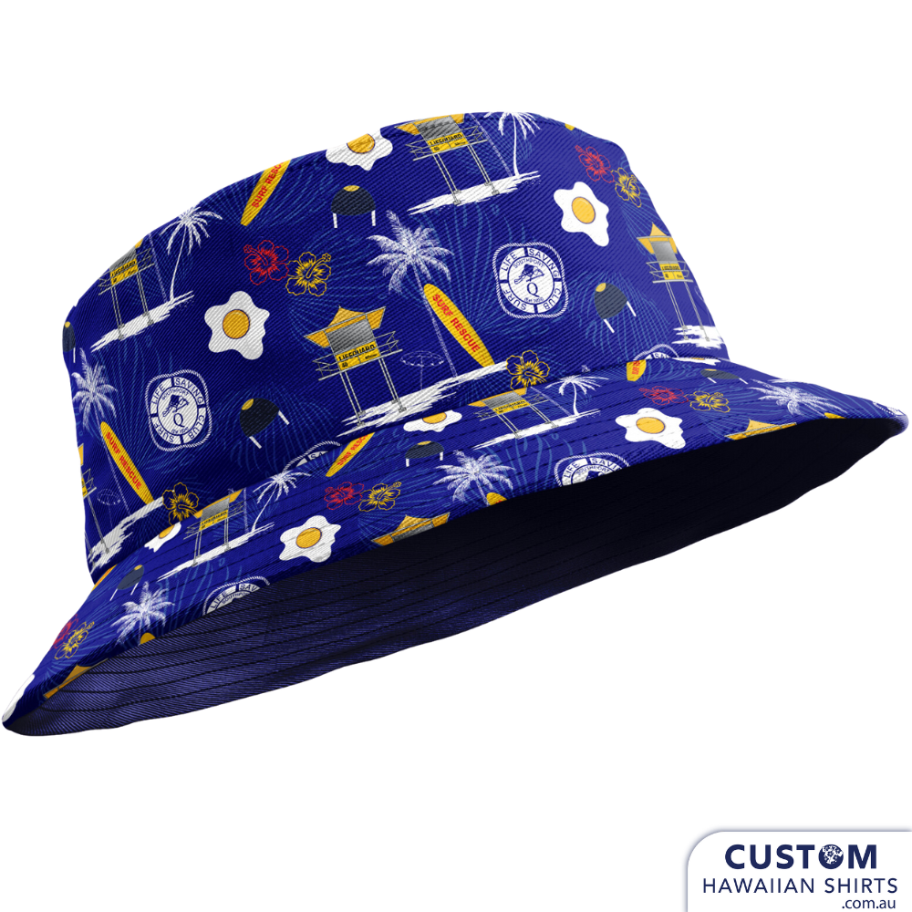 Southport Surf Life Saving Club in Queensland wanted some new custom bucket hats featuring eggs, rescue boards, a surf tower, palms and of course their logo on a dark blue base. They ordered these wicked custom bucket hats as well as long sleeved personalised Hawaiian shirts. Ask us for a free quote - free design Sunshine COast, Queensland, Australia