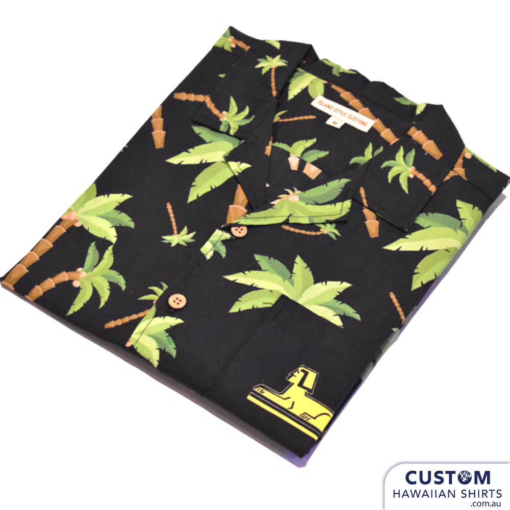 Proud to supply some custom team uniforms to Australian Military. 103 Battery Sub Unit RAA, Australian Defence Force. We really like this stylish shirt with a black base, logo on chest pocket and simply covered in palms. Very tropical vibes on this off-duty outfit.  Free quotes and design. We are based on the Sunshine Coast, Queensland. Mens Custom Hawaiian Military Shirts 100% Cotton Coconut buttons