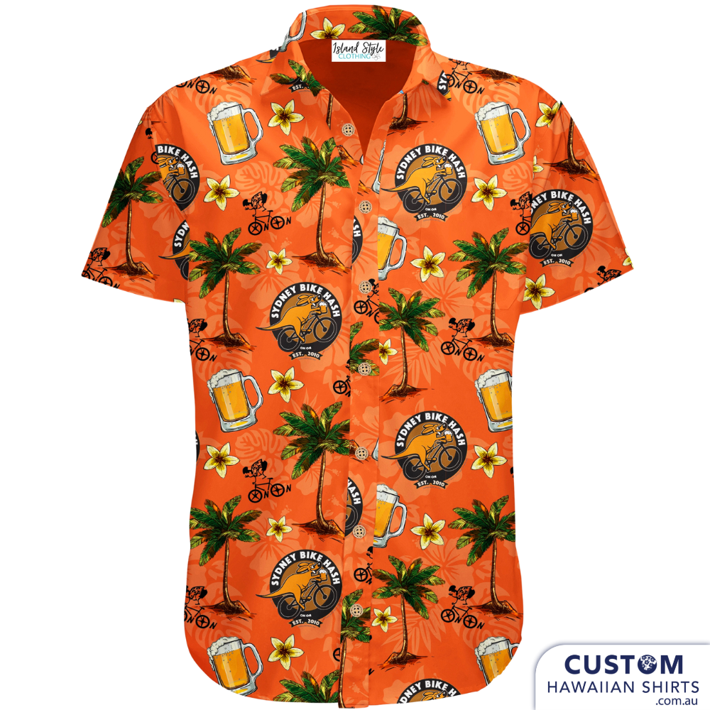 Sydney Bike Hash Harriers - Custom Sports Shirts. A fun design for this big group of friends with an orange base, their logo, palm trees and beer mugs.  100% Cotton Top Pocket Coconut Buttons