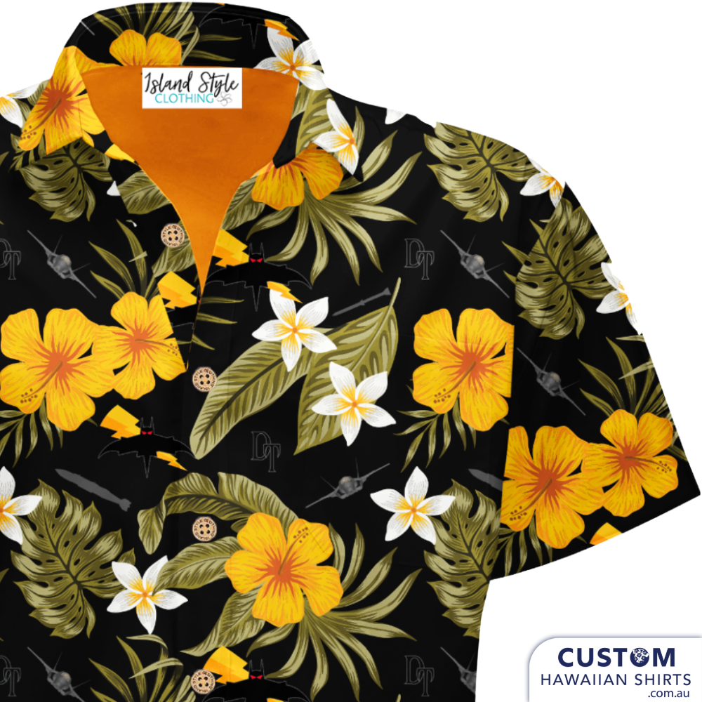Custom Military Hawaiian Shirts. Black base with leafy base, yellow hibiscus and frangipani flowers to soften up the jets and bombs. Deadly style!  Off Duty Essentials 100% Cotton Hawaiian Shirts 