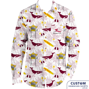 Tallebudgera Surf Life Saving Club on the Gold Coast wanted some long-sleeve cotton shirts also for custom uniforms, same design as the short-sleeve Hawaiian shirt just with extra sun cover. Design features whales, life saving tower, surf board with a background of frangipanis and palms.  100% soft rayon Chest pocket Coconut buttons