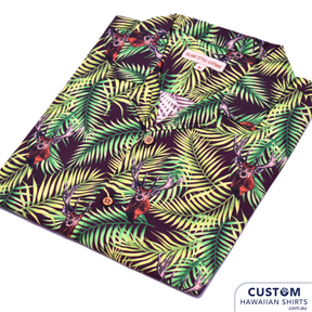Gordon Cricket Club - Team Uniforms. Interesting print with layers of palm leaves and a stag head. Stand out in your own personalised shirts. You tell us your ideas and we weave the magic. 100% Cotton Coconut buttons